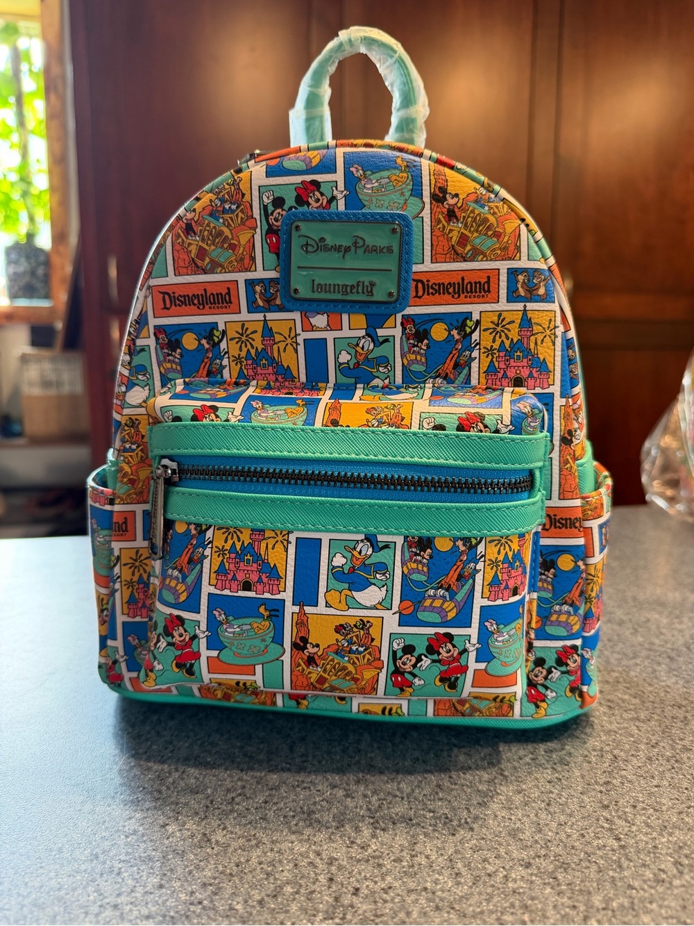 EXCLUSIVE  Loungefly Disney Parks comic strips Mini Backpack